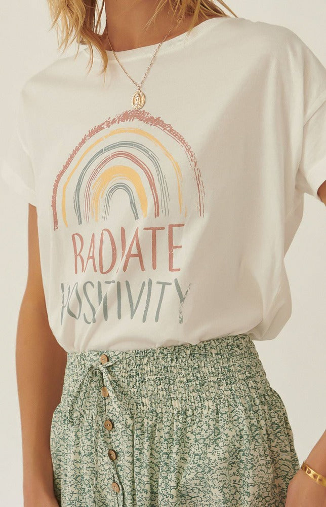 Soak up the sun in the Jenny Vintage Rainbow Radiate Positivity Graphic Tee! A garment washed graphic t-shirt with a vintage-style rainbow graphic. This shirt is sure to bring on Pair this item with the Julia wide leg pants and live free!