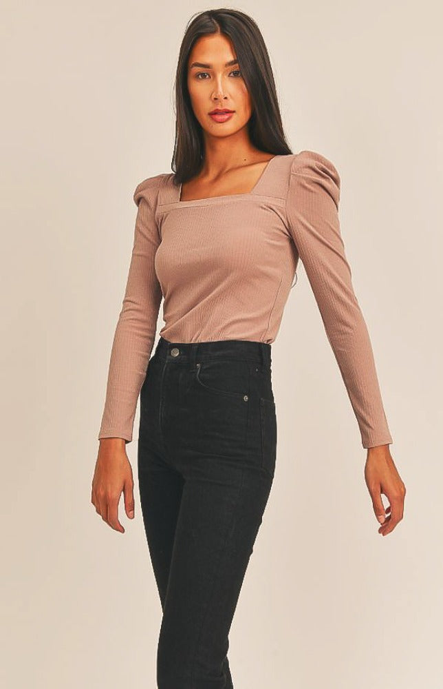 Looking amazing comes easy when you're rockin' the Jade Puff Sleeve Top! Super soft and stretchy knit fabric shapes this trendy top with a classic square neckline, long tailored sleeves, and gathered fabric at the shoulders. Pair with trousers and pumps for an elevated look!
