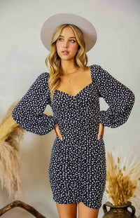 The Jewel floral printed bodycon dress in navy is the most transitional piece you'll purchase this season. She comes with a contrasting floral print, long sleeves and a figure-hugging fit. This dress can be worn on or off the shoulder. Style this with heeled mules and a floppy hat for a look we are loving.