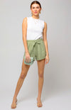 Everything will be going your way when you're wearing the Blakely Shorts! These perfect everyday shorts are shaped from lightweight woven fabric that sweeps from the elastic waist. Light and breezy fabric construct these relaxed shorts in a gorgeous light olive hue. High, elasticized waist is accented with drawstring ties and deep front pockets. 