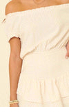 Throw on the Mikayla Blissful Cream Off-the-Shoulder Smocked Romper for a simply perfect, one-and-done look! Textured woven fabric shapes an elasticized, off-the-shoulder neckline with short, ruffled sleeves, accented with cute polka dot print all over. Smocked bodice creates a perfect fit atop matching shorts with overlapping tiers of beautiful breezy fabric.