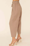 We are head over heels in love with the Katrina Woven Pinstripe Belted Paper Bag Wide Leg Pants. These cuties come with an ivory pinstripe detailed down to the ankle. The tie ribbon belt creates a paper bag waist. Dress these beauties up with heals and a blouse or down with a fitted bodysuit and flats.