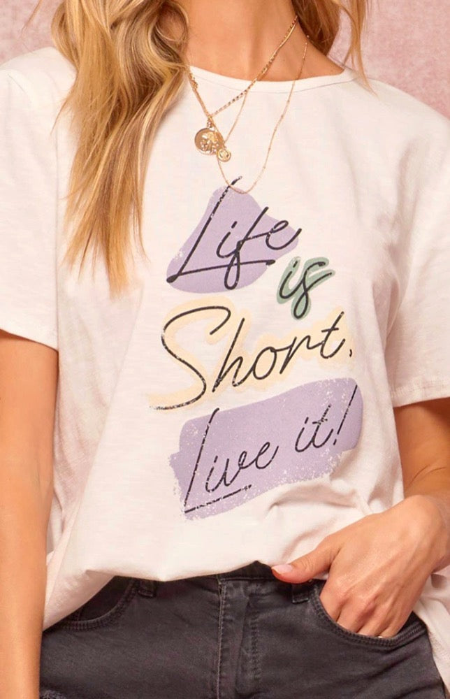 This shirt says it all. The Riley Tee is soft-to-touch and has a beautiful pastel lavender, green and yellow colored “Life is Short, Live it" statement detail. Pair with boyfriend jeans, chic sneakers and you're set to go!