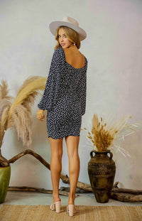 The Jewel floral printed bodycon dress in navy is the most transitional piece you'll purchase this season. She comes with a contrasting floral print, long sleeves and a figure-hugging fit. This dress can be worn on or off the shoulder. Style this with heeled mules and a floppy hat for a look we are loving.