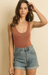 You're going to love everything about the Kennedy scoop neck bodysuit! Kennedy features a ribbed cotton-blend stretch knit fabric that shapes this cute bodysuit with wide straps and a scoop neckline. The fitted bodice ends at thong bottoms. This versatile bodysuit can be paired with jeans or a skirt for a casually cute vibe! 